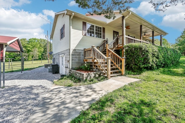 46 Seay Ln, Erin, TN 37061 - view of front of property featuring ceiling fan, stairway, and driveway
