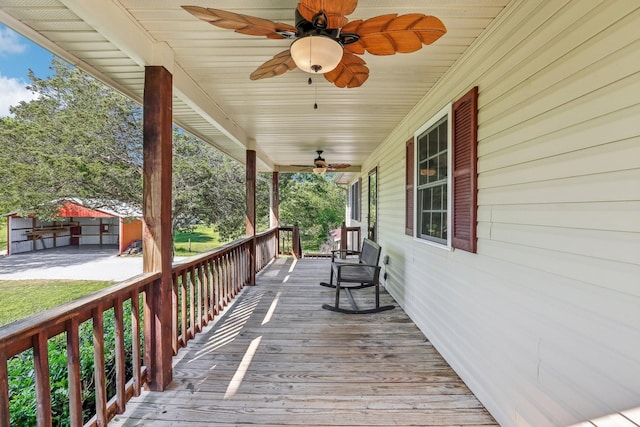 46 Seay Ln, Erin, TN 37061 - wooden deck featuring a porch and a ceiling fan