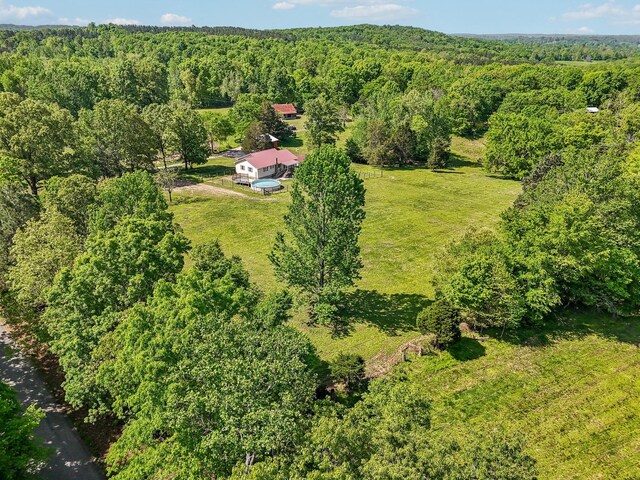 46 Seay Ln, Erin, TN 37061 - aerial view of property and surrounding area with a heavily wooded area