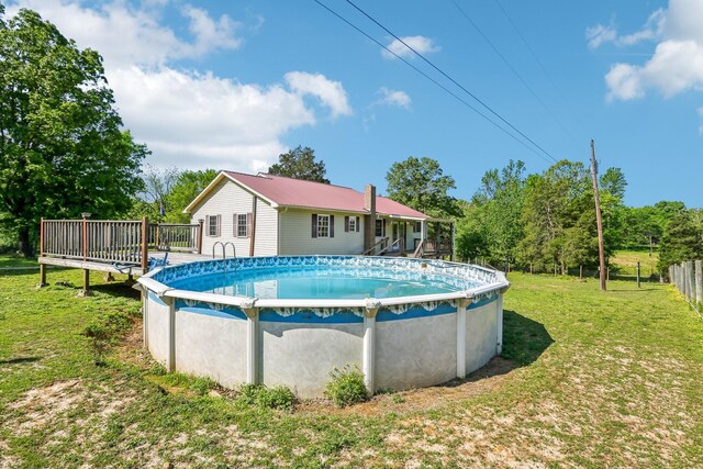 46 Seay Ln, Erin, TN 37061 - outdoor pool with a deck and a lawn