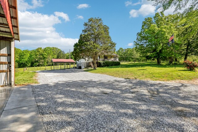 46 Seay Ln, Erin, TN 37061 - view of green lawn featuring gravel driveway
