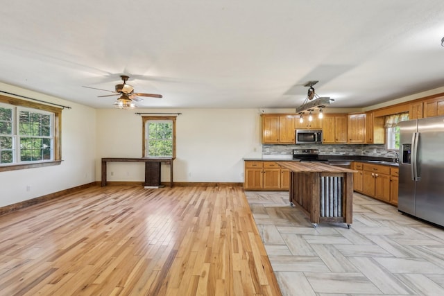 46 Seay Ln, Erin, TN 37061 - kitchen featuring appliances with stainless steel finishes, a sink, and healthy amount of natural light