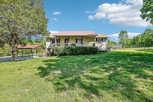 46 Seay Ln, Erin, TN 37061 - view of front of property with a carport, ceiling fan, metal roof, and a porch