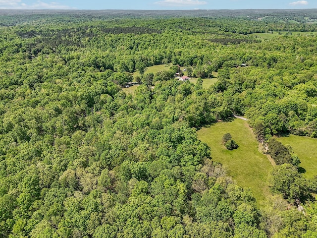 46 Seay Ln, Erin, TN 37061 - aerial view of property and surrounding area with a heavily wooded area