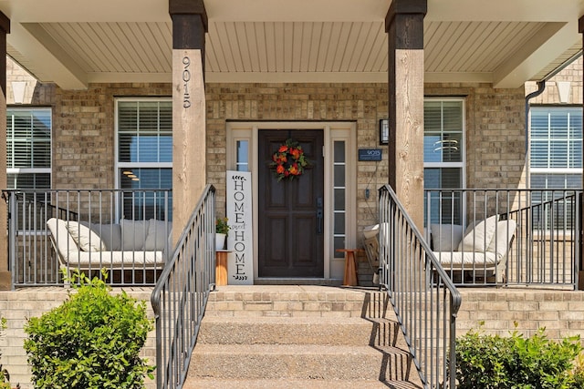 9015 Grayson Cir, Mount Juliet, TN 37122 - view of exterior entry with covered porch and stone siding