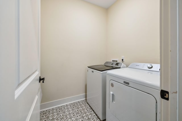 9015 Grayson Cir, Mount Juliet, TN 37122 - washroom featuring separate washer and dryer, baseboards, and light tile patterned flooring
