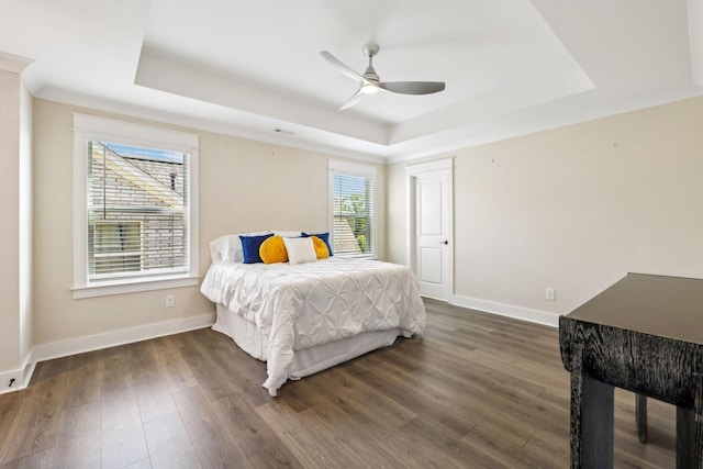 9015 Grayson Cir, Mount Juliet, TN 37122 - bedroom featuring a raised ceiling, baseboards, dark wood-type flooring, and ceiling fan