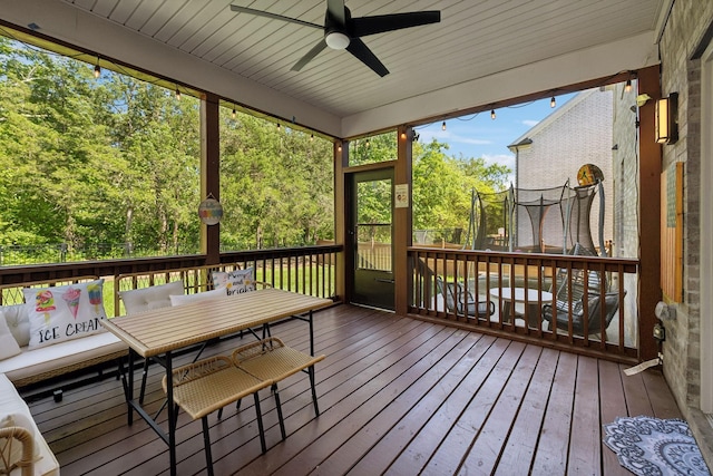 9015 Grayson Cir, Mount Juliet, TN 37122 - wooden deck featuring ceiling fan, outdoor dining space, and a trampoline