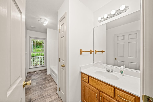 490 Luckey Ln, Sparta, TN 38583 - bathroom with wood finished floors and vanity
