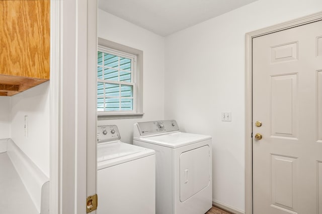 490 Luckey Ln, Sparta, TN 38583 - laundry area featuring separate washer and dryer and cabinet space
