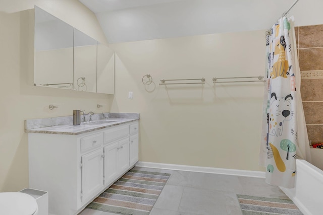 1186 Peebles Dr, Smyrna, TN 37167 - bathroom with toilet, vanity, shower / bath combo with shower curtain, baseboards, and lofted ceiling