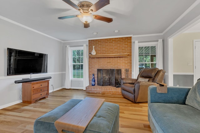1186 Peebles Dr, Smyrna, TN 37167 - living room with a ceiling fan, wood finished floors, ornamental molding, baseboards, and a fireplace