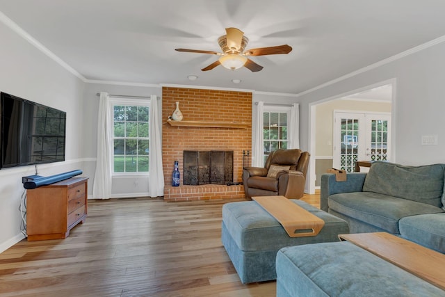 1186 Peebles Dr, Smyrna, TN 37167 - living area with a ceiling fan, french doors, wood finished floors, ornamental molding, and baseboards