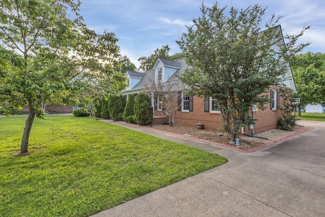 1186 Peebles Dr, Smyrna, TN 37167 - view of side of home featuring a lawn and brick siding