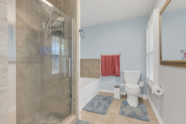 1186 Peebles Dr, Smyrna, TN 37167 - bathroom featuring a shower stall, tile patterned flooring, toilet, baseboards, and a garden tub