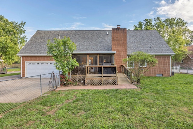 1186 Peebles Dr, Smyrna, TN 37167 - view of front of home with a sunroom, driveway, a shingled roof, an attached garage, and brick siding
