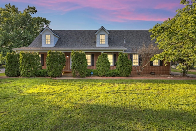 1186 Peebles Dr, Smyrna, TN 37167 - new england style home with a yard, brick siding, and a shingled roof