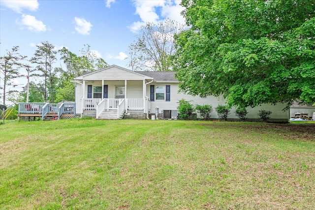 214 Old State Rd, Sparta, TN 38583 - single story home with central AC, a porch, and a front lawn