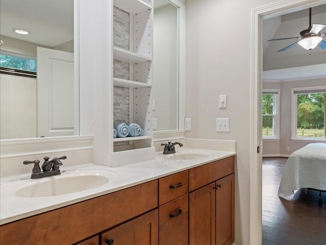 3904 Rowland Rd, Murfreesboro, TN 37128 - bathroom with connected bathroom, wood finished floors, ceiling fan, and double vanity