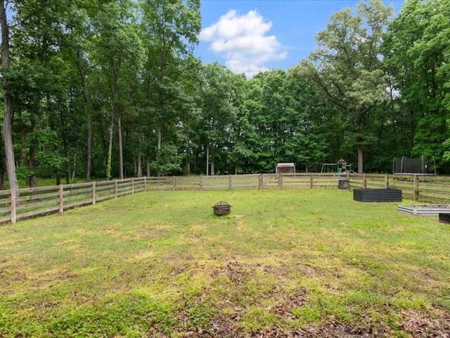 3904 Rowland Rd, Murfreesboro, TN 37128 - view of yard with a vegetable garden and a forest view