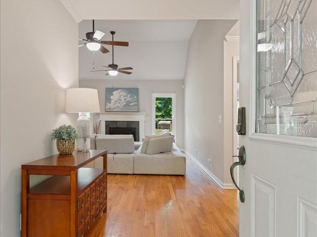 3904 Rowland Rd, Murfreesboro, TN 37128 - living area featuring a ceiling fan, lofted ceiling, light wood-type flooring, a fireplace, and baseboards