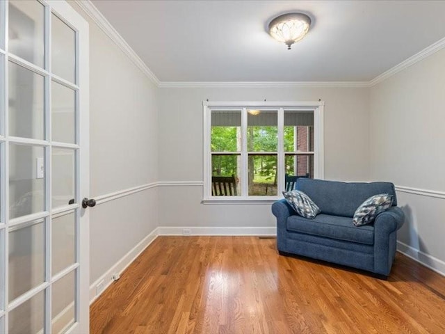 3904 Rowland Rd, Murfreesboro, TN 37128 - sitting room with wood finished floors, crown molding, and baseboards