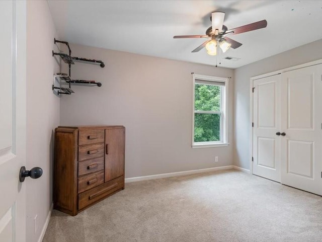 3904 Rowland Rd, Murfreesboro, TN 37128 - unfurnished bedroom featuring light carpet, baseboards, a closet, and a ceiling fan