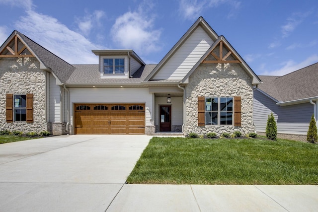 2060 Rylee Way Unit 54, Greenbrier, TN 37073 - craftsman inspired home with stone siding, driveway, a front lawn, a garage, and roof with shingles