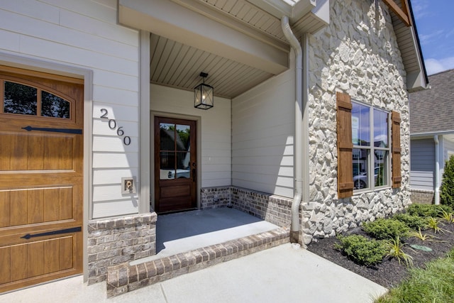2060 Rylee Way Unit 54, Greenbrier, TN 37073 - entrance to property with stone siding and covered porch