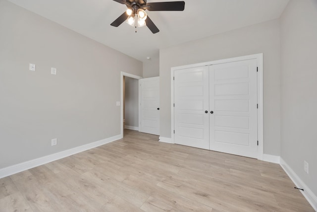 2050 Rylee Way, Greenbrier, TN 37073 - unfurnished bedroom with light wood finished floors, baseboards, and a closet