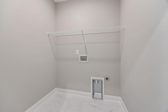 2050 Rylee Way, Greenbrier, TN 37073 - laundry room featuring electric dryer hookup, hookup for a washing machine, light marble finish flooring, and baseboards