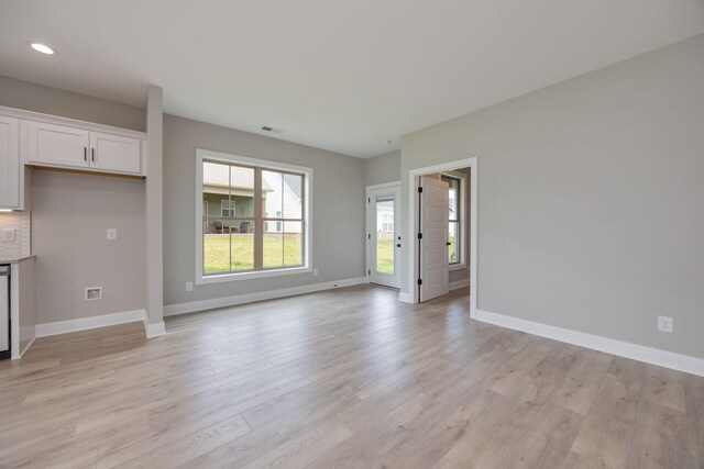 2050 Rylee Way, Greenbrier, TN 37073 - unfurnished living room featuring baseboards, light wood-type flooring, and recessed lighting