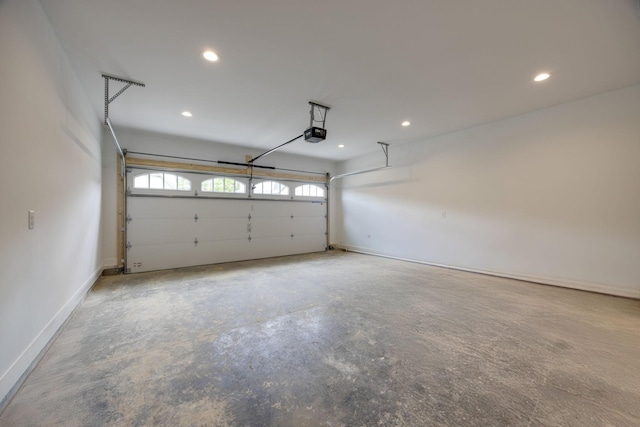 2050 Rylee Way, Greenbrier, TN 37073 - garage with a garage door opener, recessed lighting, and baseboards