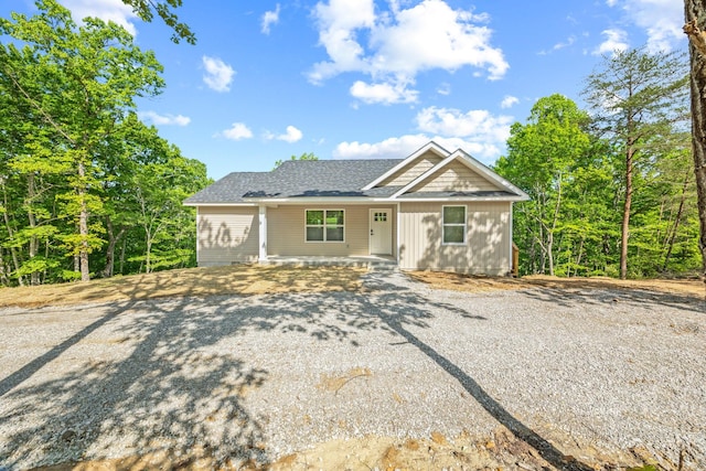 5706 Wilder Rd S, Grimsley, TN 38565 - ranch-style home featuring roof with shingles and covered porch