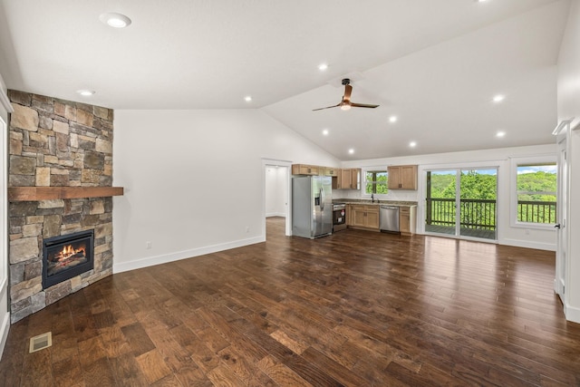 5706 Wilder Rd S, Grimsley, TN 38565 - unfurnished living room with a ceiling fan, a fireplace, lofted ceiling, dark wood-style flooring, and a sink