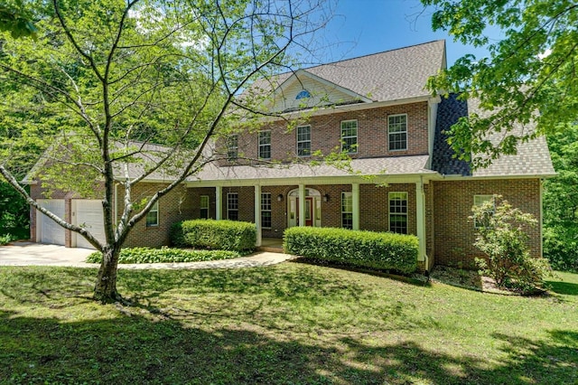550 Tanya Dr, Whitwell, TN 37397 - view of front of property with roof with shingles, a front yard, driveway, and brick siding