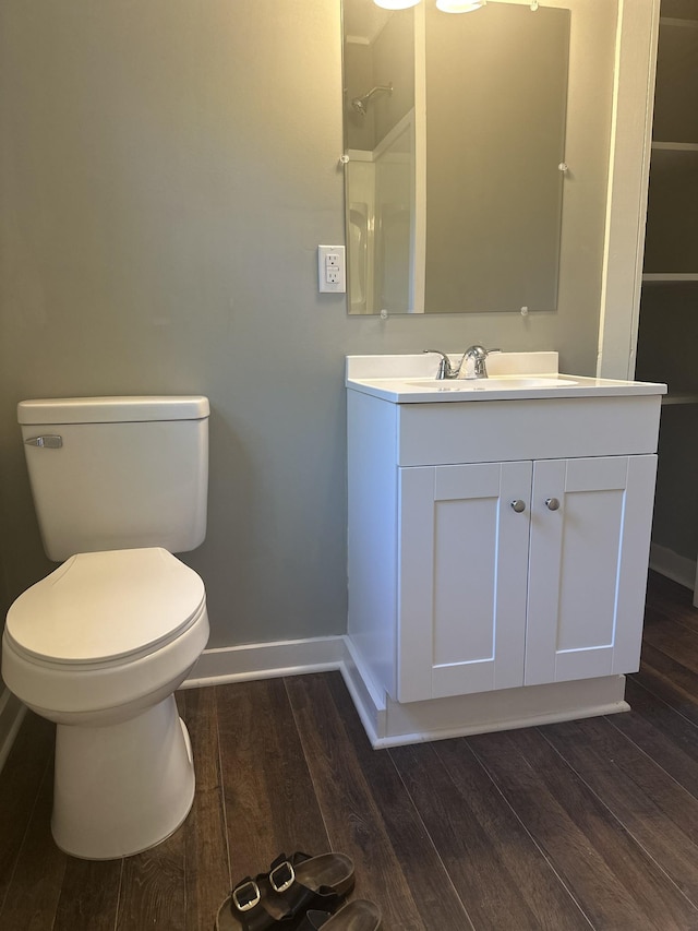 1207 Swanson Blvd, Fayetteville, TN 37334 - full bath featuring baseboards, wood finished floors, vanity, toilet, and a shower
