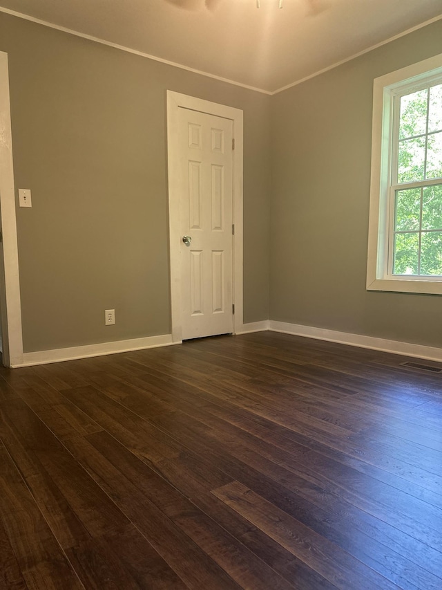 1207 Swanson Blvd, Fayetteville, TN 37334 - empty room with dark wood-style floors, baseboards, and ornamental molding