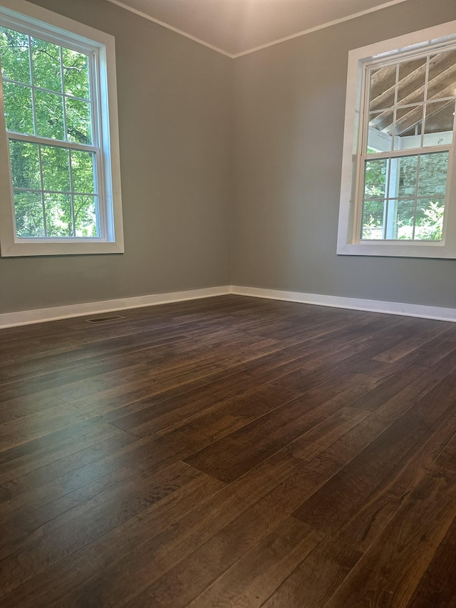 1207 Swanson Blvd, Fayetteville, TN 37334 - unfurnished room featuring baseboards, ornamental molding, and dark wood finished floors