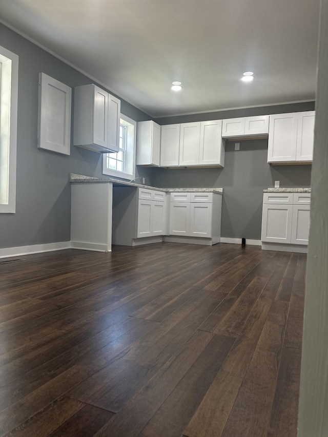1207 Swanson Blvd, Fayetteville, TN 37334 - kitchen featuring dark wood-style floors, white cabinetry, baseboards, recessed lighting, and ornamental molding