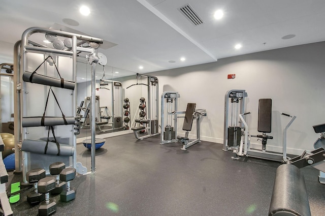 workout area with recessed lighting