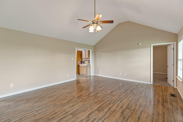 2405 Cason Ln, Lewisburg, TN 37091 - spare room featuring a ceiling fan, lofted ceiling, dark wood-style flooring, and baseboards