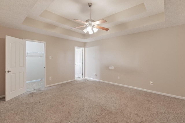 2405 Cason Ln, Lewisburg, TN 37091 - carpeted empty room featuring a raised ceiling, baseboards, and ceiling fan