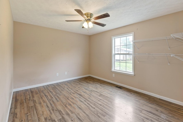 2405 Cason Ln, Lewisburg, TN 37091 - empty room with wood finished floors, baseboards, and a ceiling fan