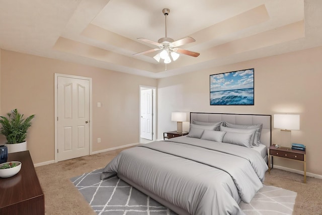 2405 Cason Ln, Lewisburg, TN 37091 - carpeted bedroom with a tray ceiling, baseboards, and a ceiling fan
