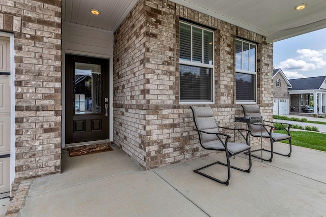 416 Golden Meadow Ln, Hendersonville, TN 37075 - view of exterior entry with a porch and brick siding