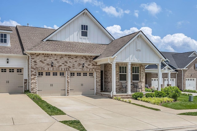 416 Golden Meadow Ln, Hendersonville, TN 37075 - view of front facade featuring board and batten siding, a porch, concrete driveway, and roof with shingles