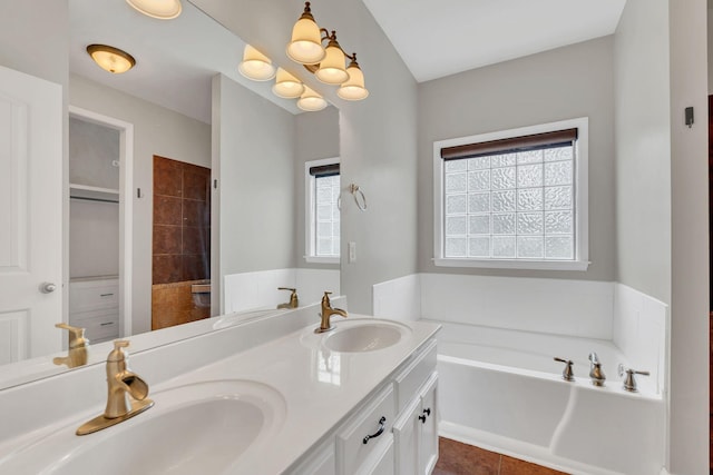 580 Laurel Ln, Murfreesboro, TN 37127 - bathroom with a bath, double vanity, and tile patterned flooring
