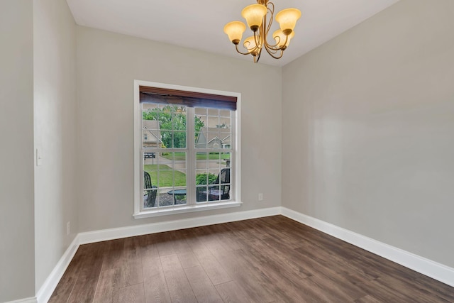 580 Laurel Ln, Murfreesboro, TN 37127 - empty room with a chandelier, dark wood-style floors, and baseboards
