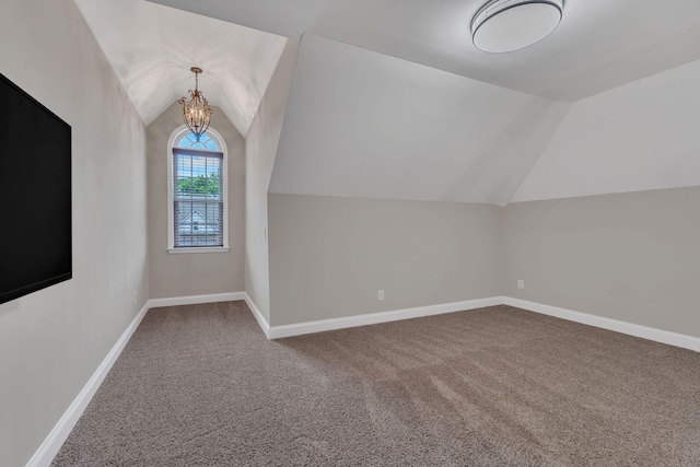 580 Laurel Ln, Murfreesboro, TN 37127 - bonus room with lofted ceiling, carpet floors, baseboards, and a chandelier